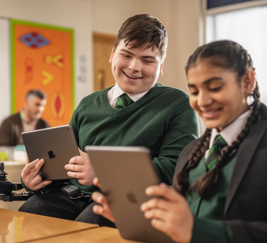 Students using iPad in class